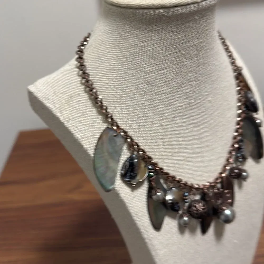 Lia Sophia Signed Bronze necklace with Abalone, Fresh Water Pearls and Charms.